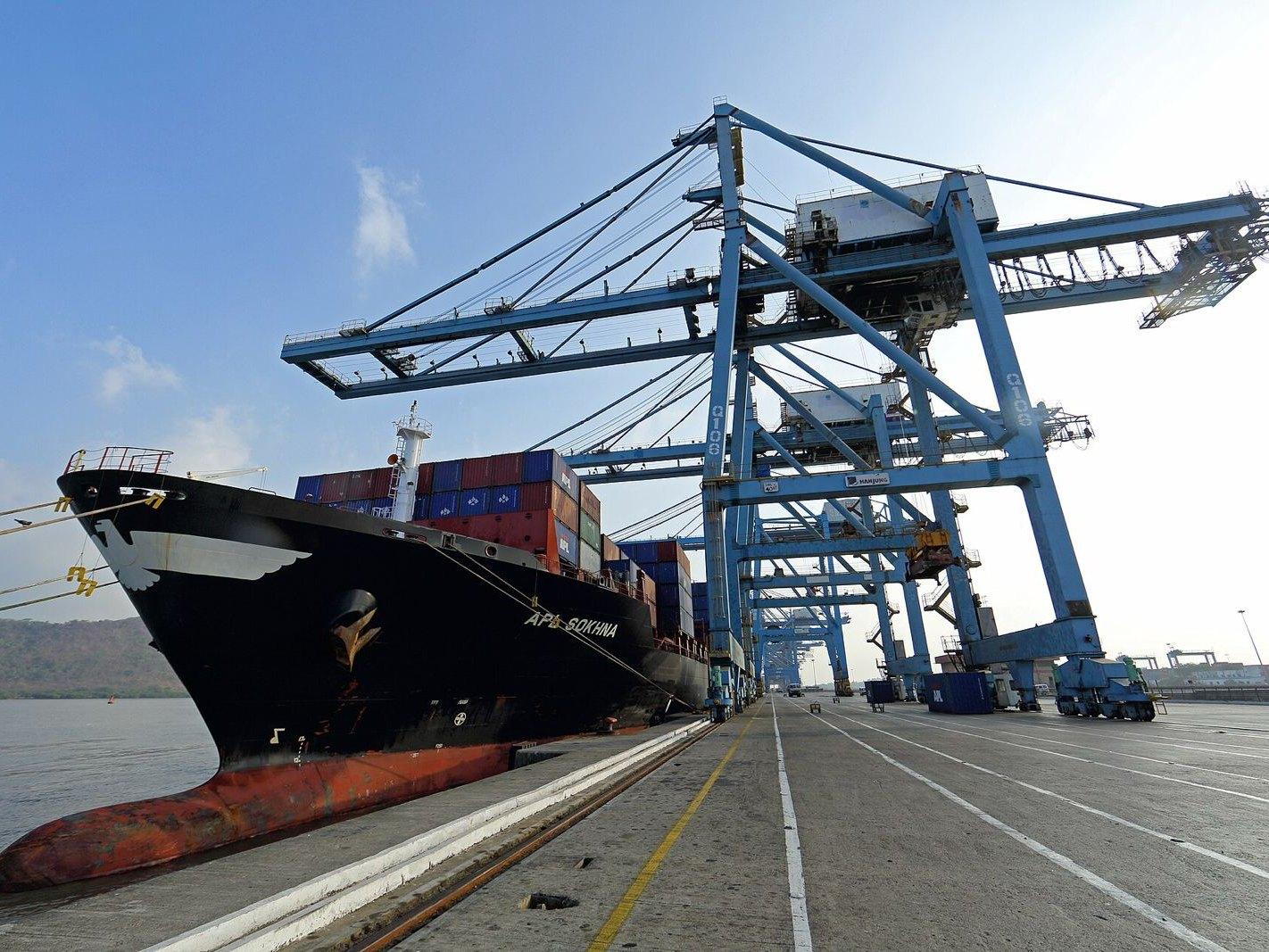 Container ship loading at port for export